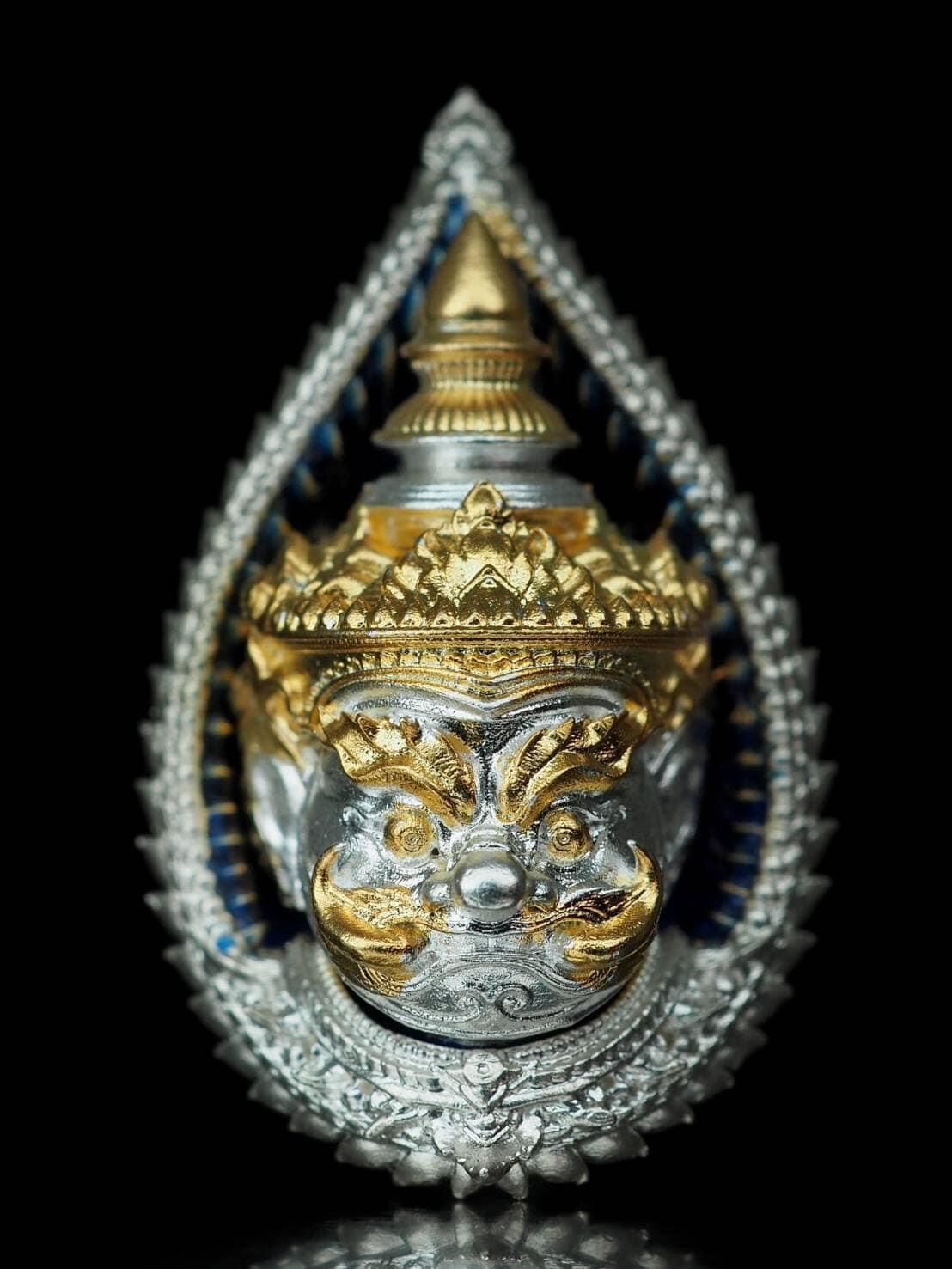 Detailed giant guardian amulet gift set with gold and silver finishes in ornate protective casing