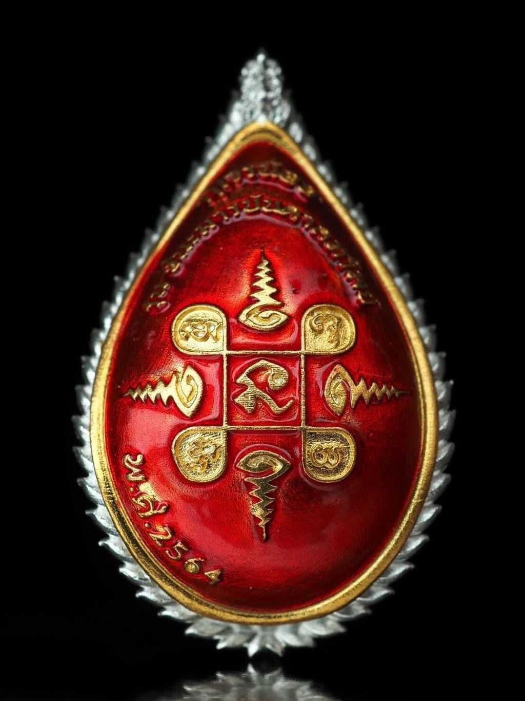 Red and gold giant guardian amulet gift set with intricate Thai designs and silver frame