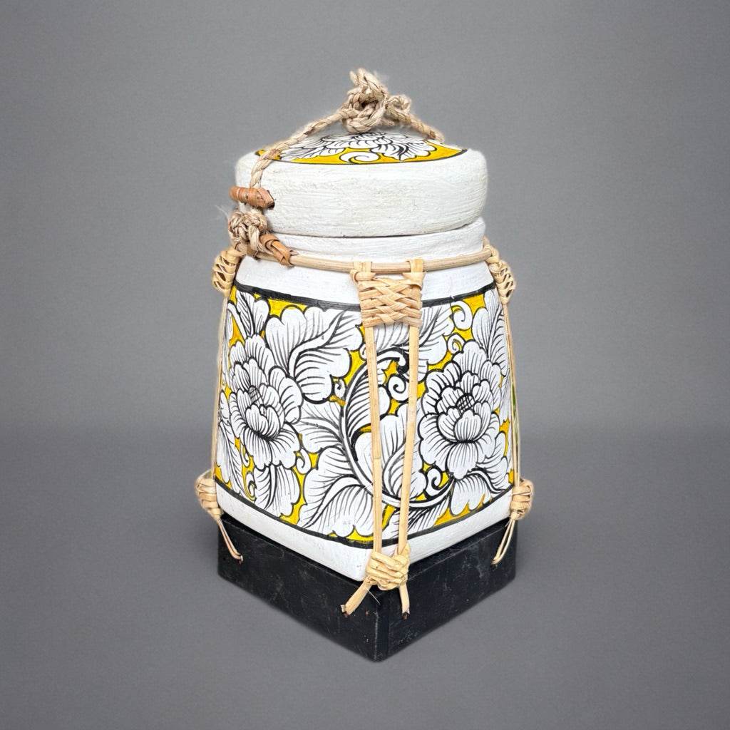 Handcrafted bamboo jewelry box with white floral design and yellow accents by One-Sake.com