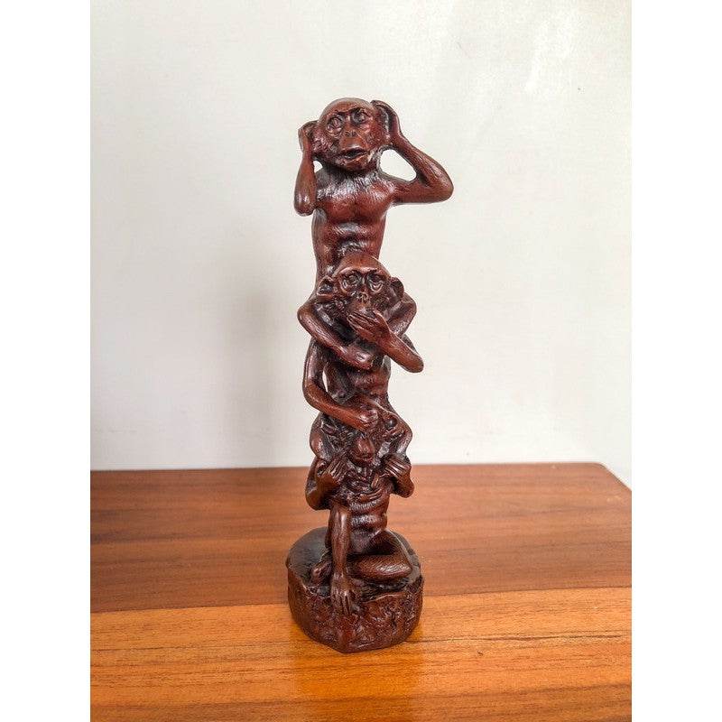 Wooden carved statue of three monkeys symbolizing see no evil hear no evil speak no evil buddhist mindfulness home decor