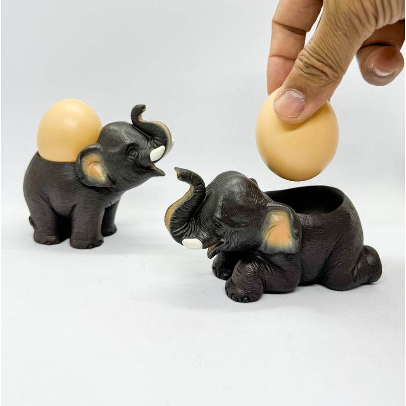 Handcrafted resin elephant decor egg holders with dark brown finish holding eggs on white background