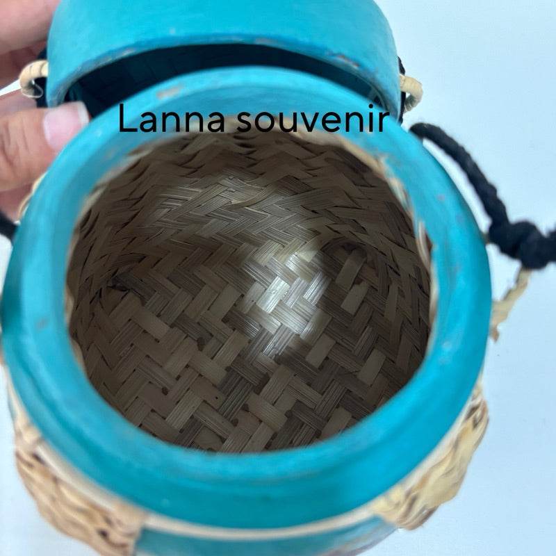Handmade Thai bamboo rice box with blue rim and woven interior from One-Sake.com