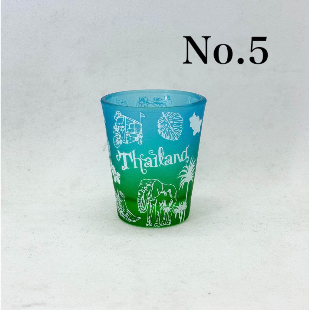 Handmade Thailand mini tumbler in blue and green with white Thailand-themed illustrations