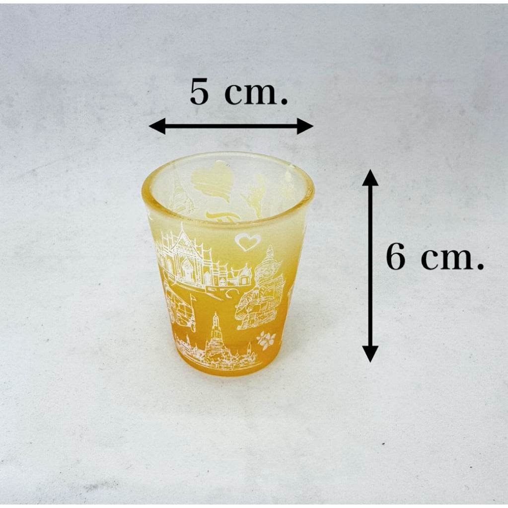Handmade Thailand mini tumbler yellow glass with white traditional designs and 5 cm by 6 cm size