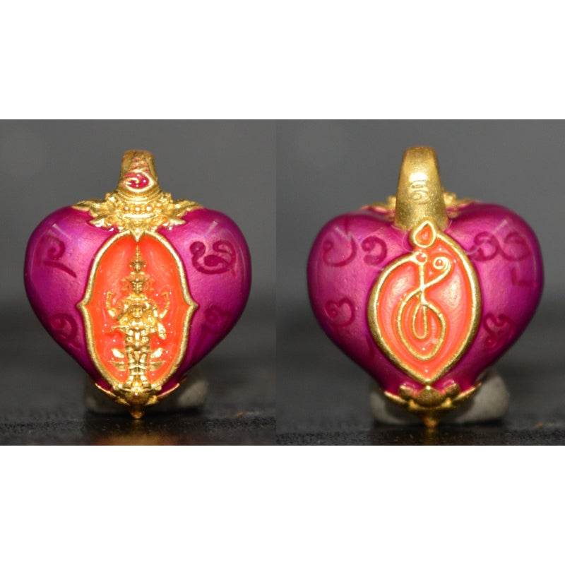 Heart of Trimurti love amulet with intricate designs in pink and gold for spiritual protection and attraction