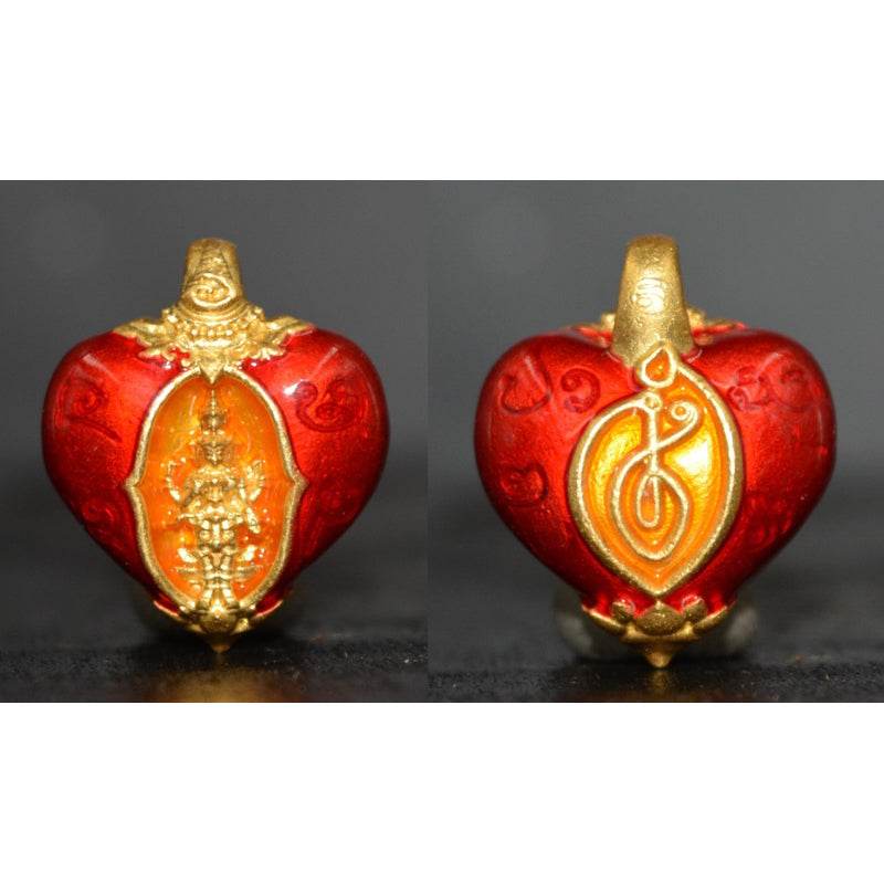Heart of Trimurti love amulet in red and gold with intricate designs on both sides