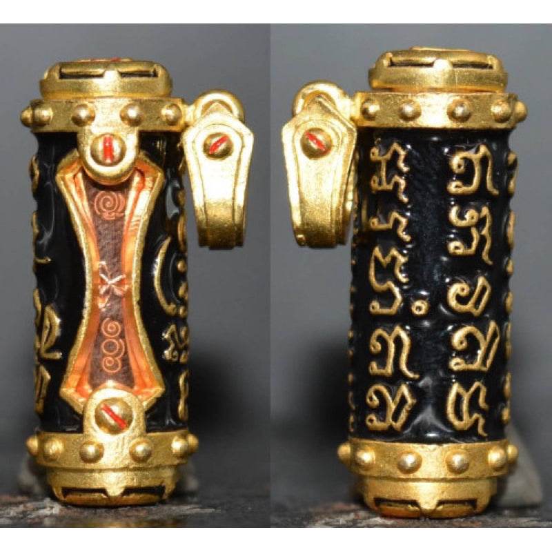 Jindamanee Takrut Thai amulet for wealth featuring intricate golden designs and protective symbols