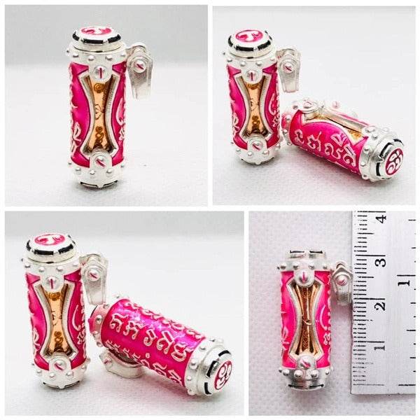 Jindamanee Takrut Thai amulet for wealth with vibrant pink design and silver accents for prosperity