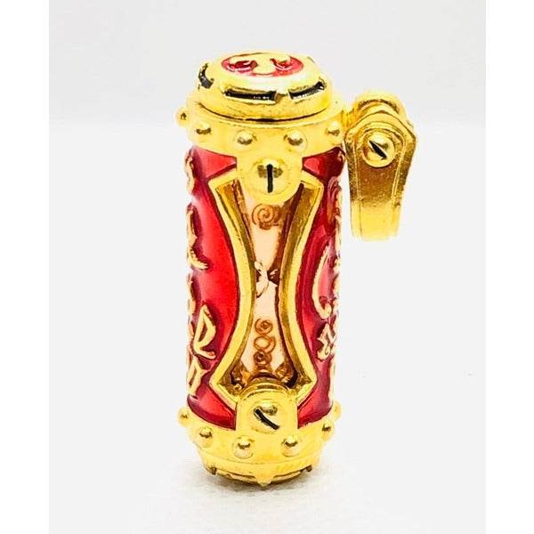 Jindamanee Takrut Thai amulet for wealth with intricate red and gold detailing for prosperity