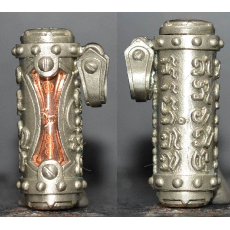 Jindamanee Takrut Thai amulet for wealth in silver with intricate designs and protective charms