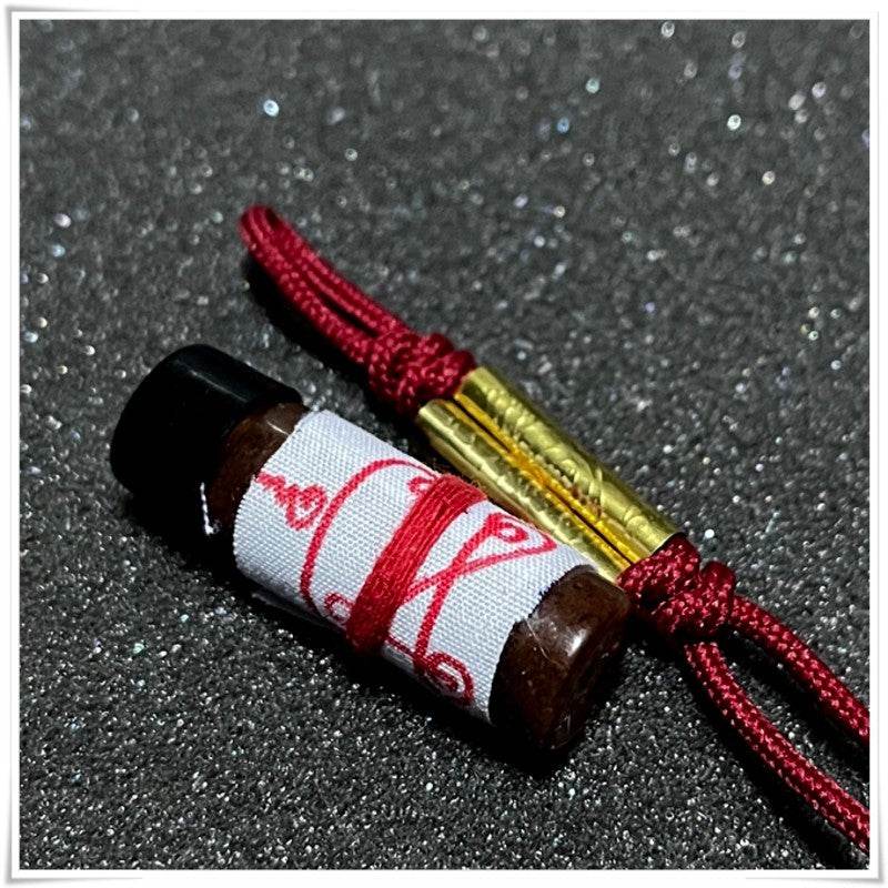 Khmer attraction oil for love and luck in a decorative bottle by Thai Blessing Co
