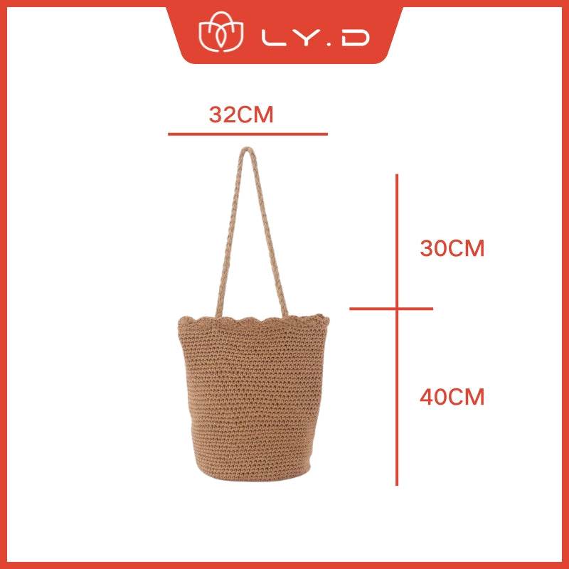 Korean style handwoven shoulder bag in brown with long strap and scalloped edge details