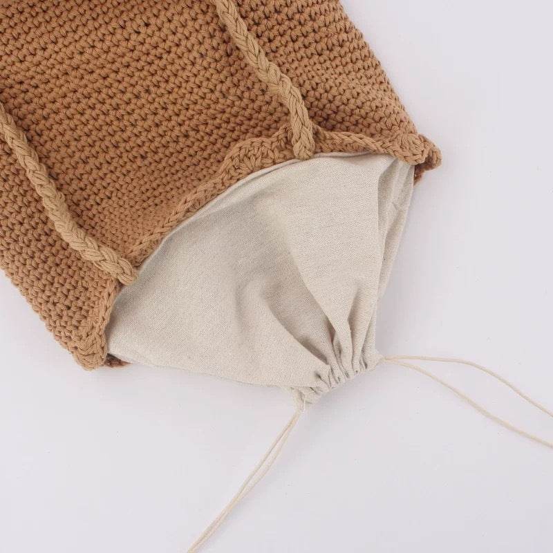 Brown Korean style handwoven shoulder bag with beige drawstring lining for secure closure