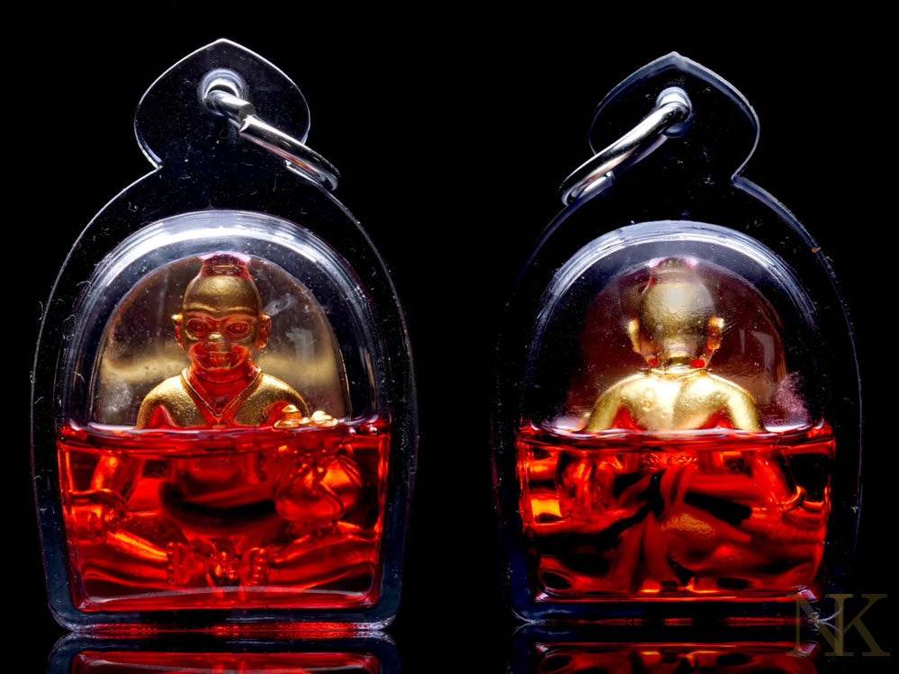 Kuman Chao Sua Noi rich guardian talisman encased in a protective locket with red accents