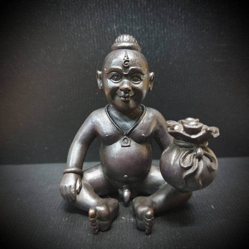 Kuman Chao Sua Noi rich guardian talisman statue crafted from dark metal for good luck and protection