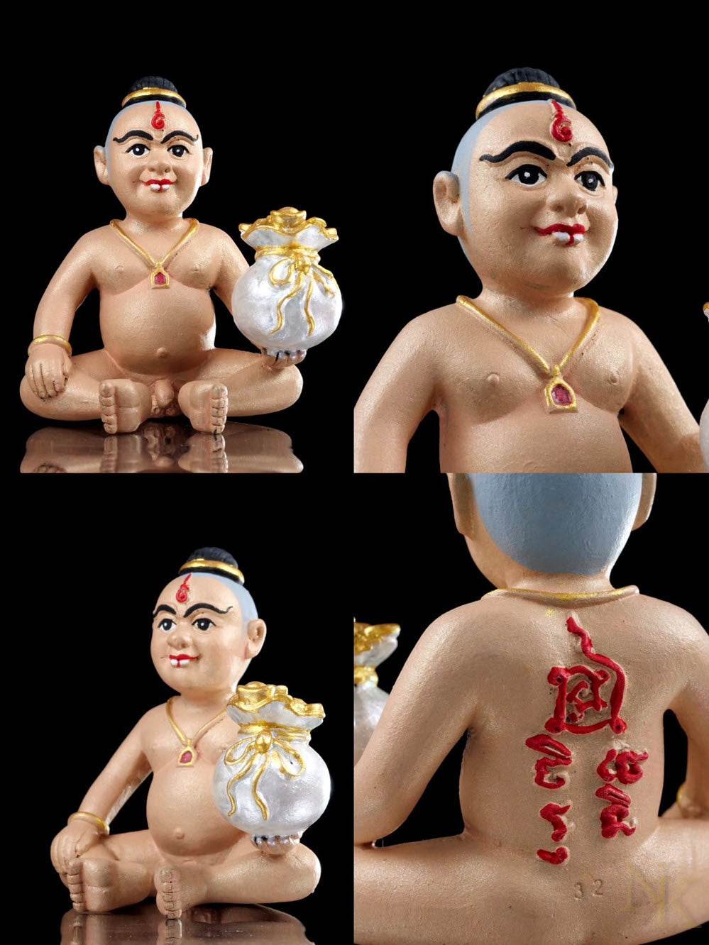 Kuman Chao Sua Noi rich guardian talisman statue holding a golden bag for good fortune