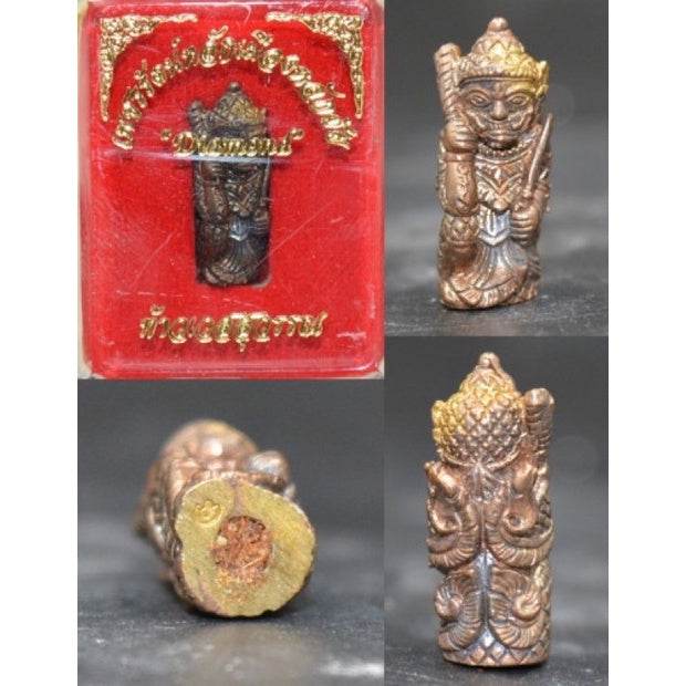 Lanna guardian wealth protection charm in bronze with detailed carving, offering spiritual prosperity