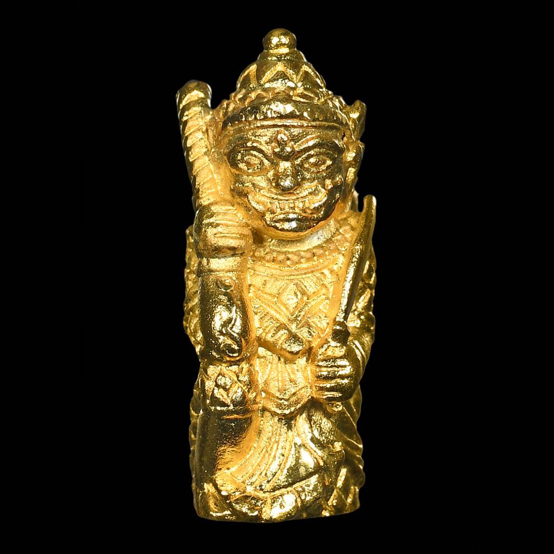Lanna guardian wealth protection charm in gold color, depicting a detailed statue for prosperity