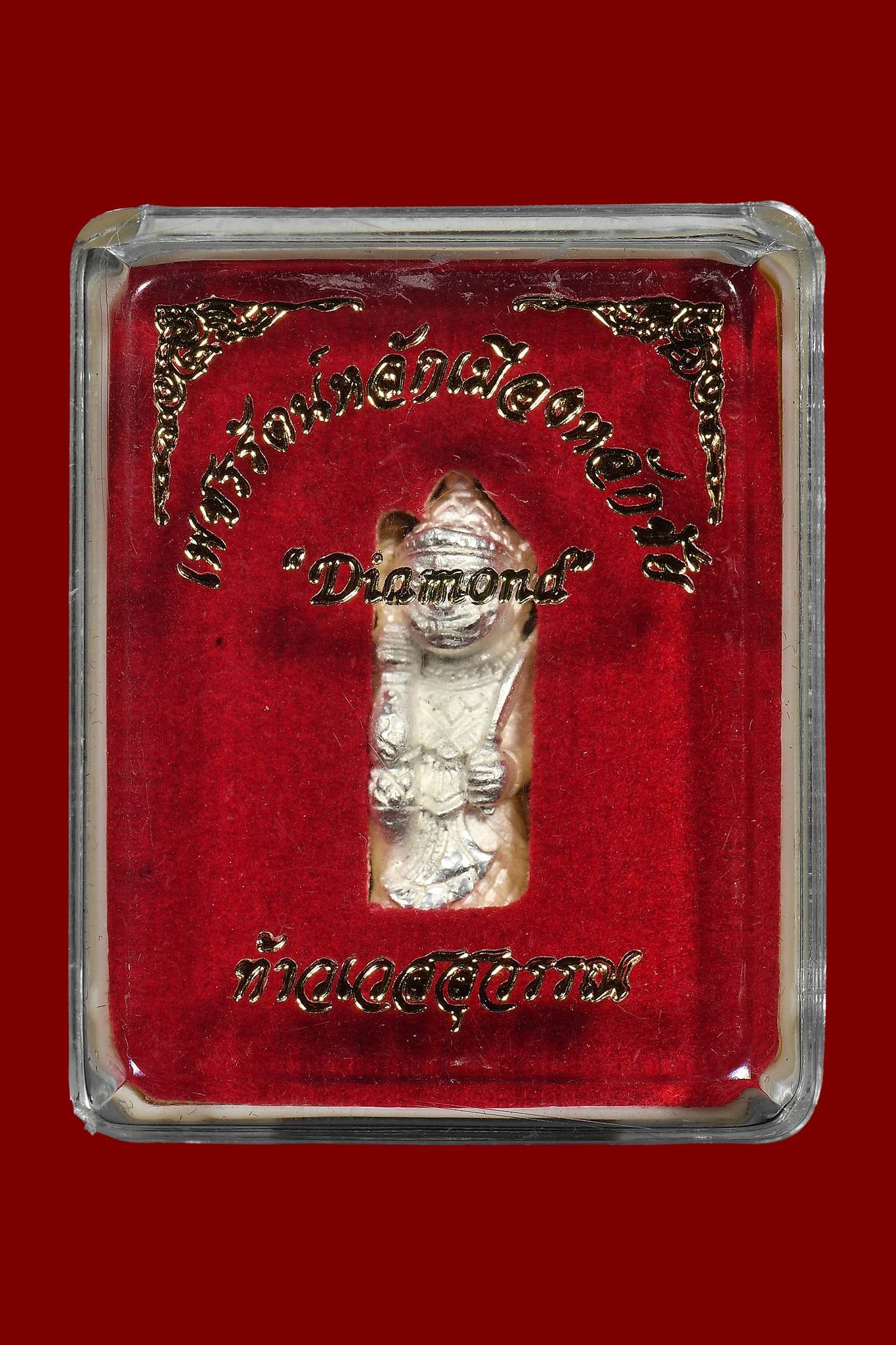 Lanna guardian wealth protection charm in decorative case for enhancing prosperity and good fortune