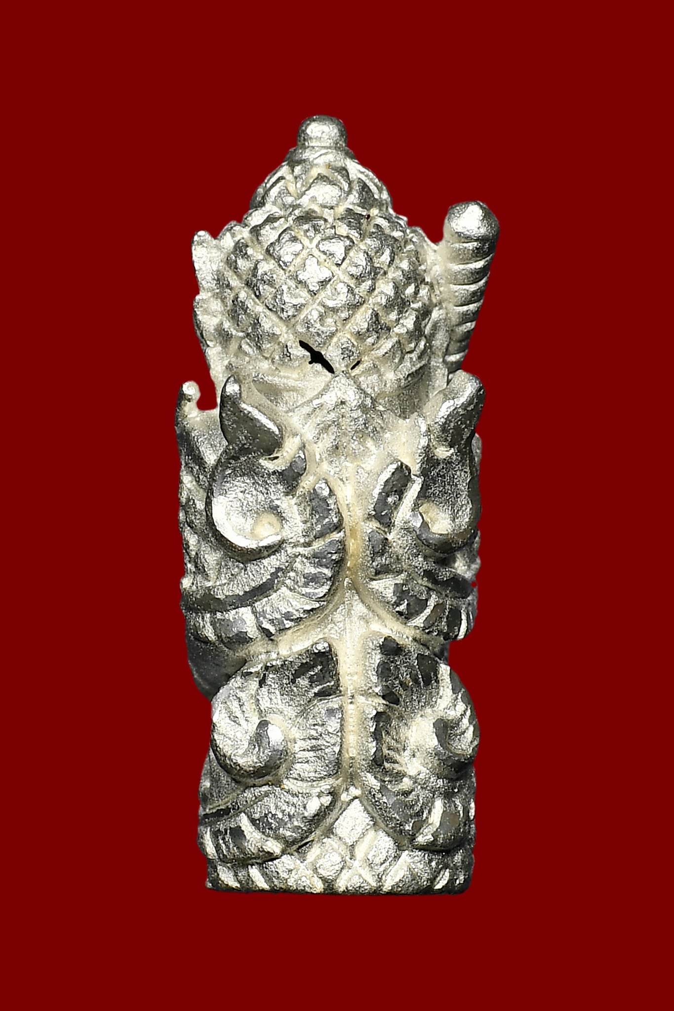 Lanna guardian wealth protection charm intricately designed in silver for home feng shui and spiritual protection