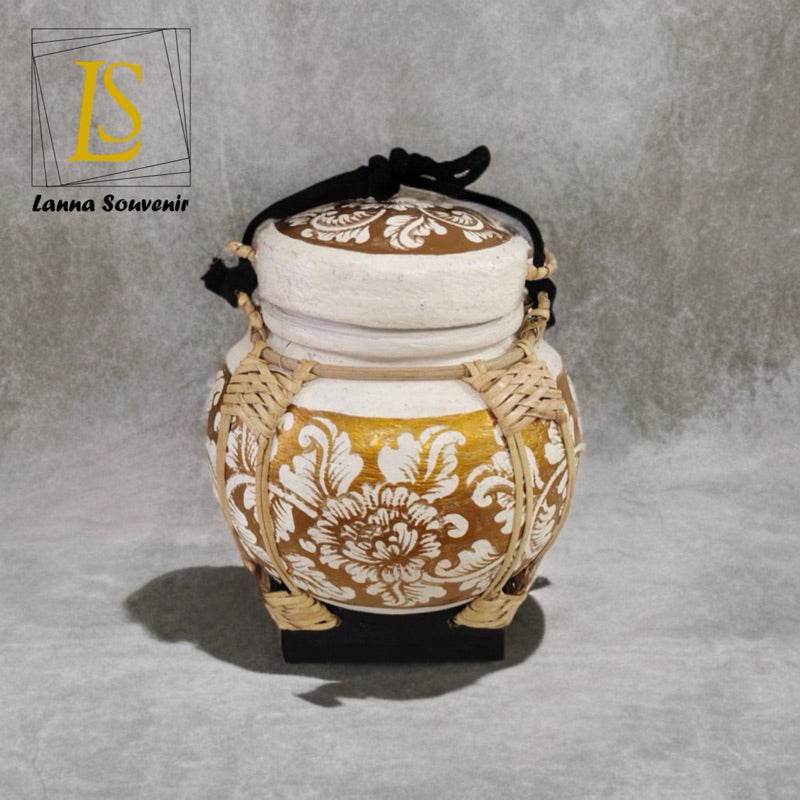 Handmade bamboo rice box with decorative floral patterns and black carrying strap by One-Sake.com
