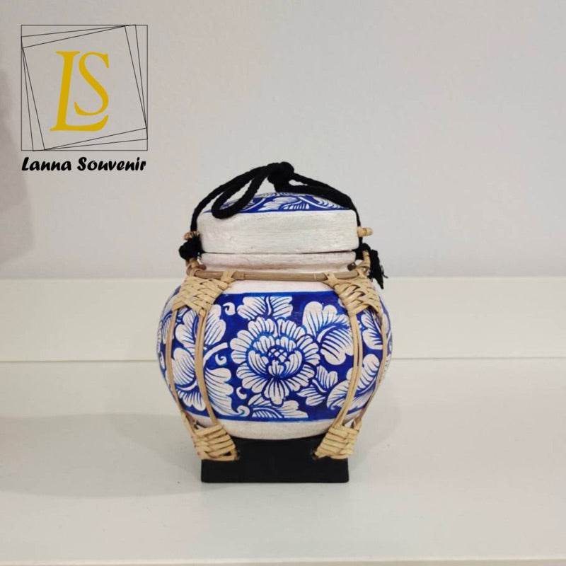 Handmade bamboo rice box with blue and white floral ceramic design and woven bamboo accents