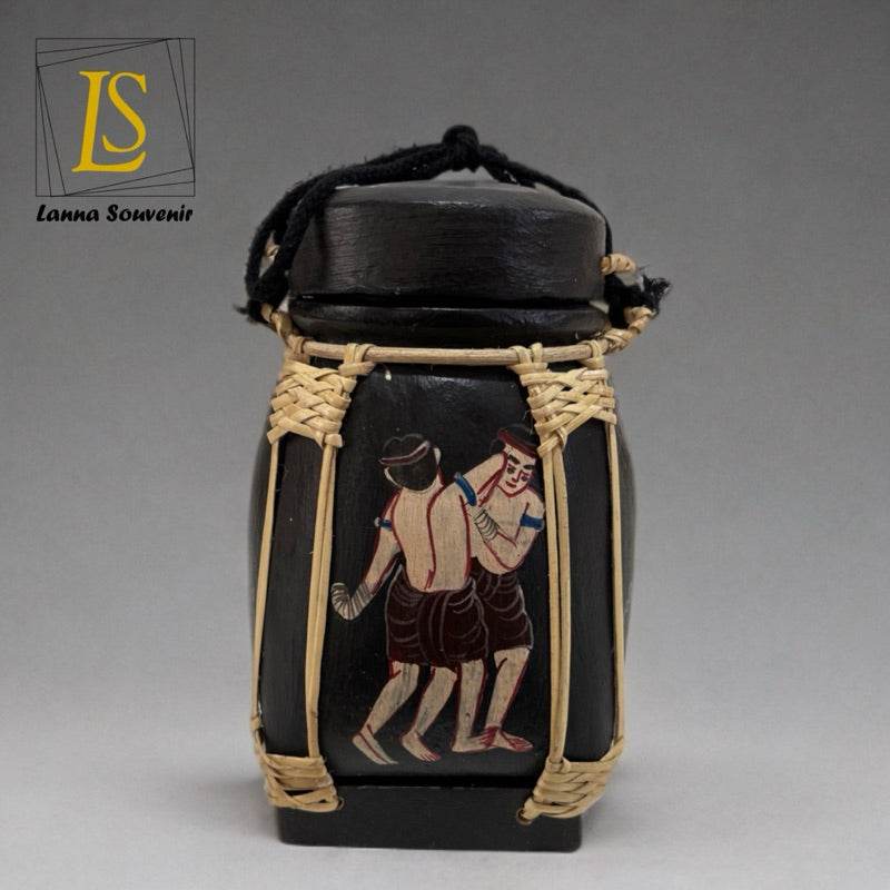 Handmade Thai decorative jar with black finish and traditional painted figures wrapped in natural woven material