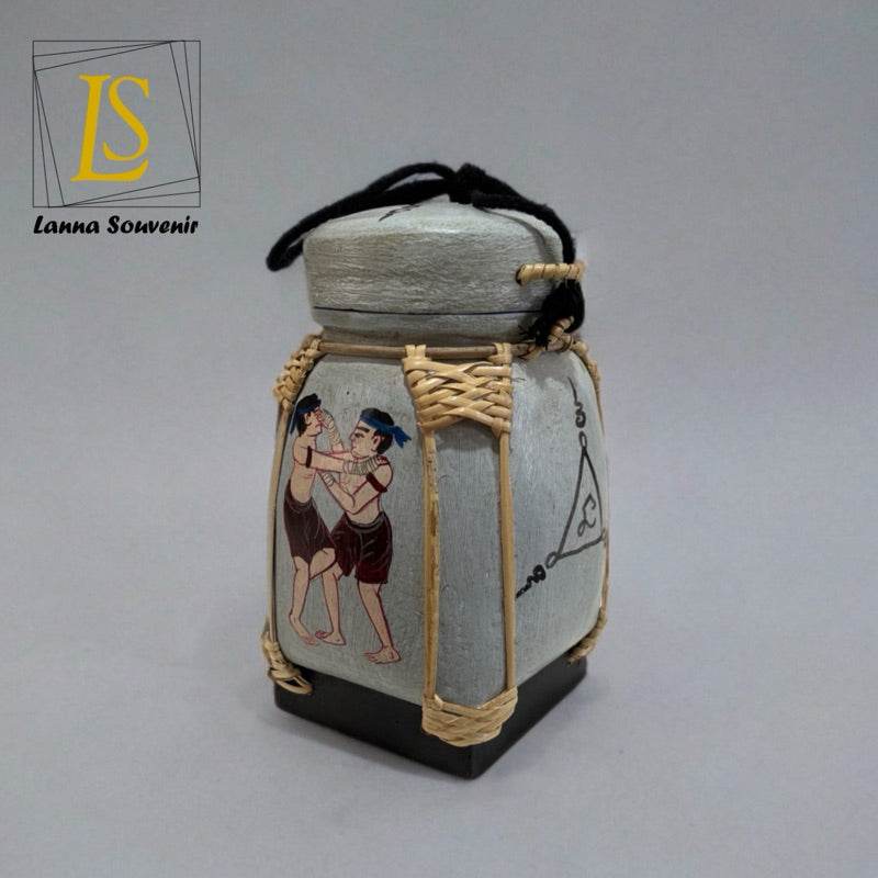 Handmade Thai decorative jar with traditional artwork and woven details from One-Sake.com