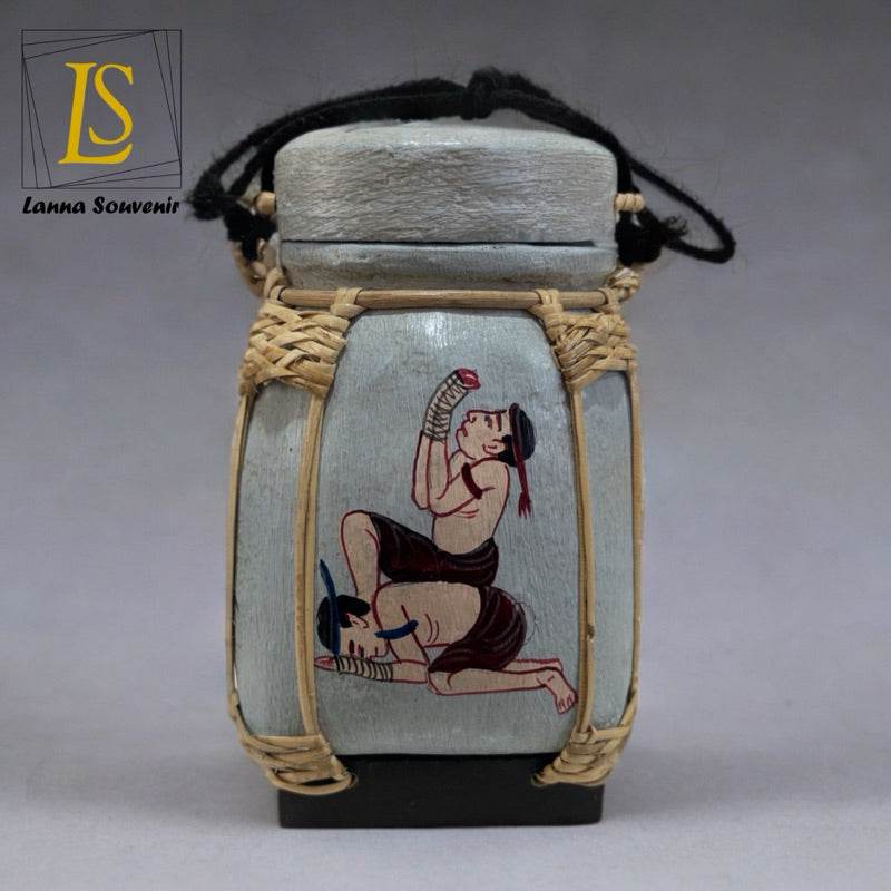 Handmade Thai decorative jar with traditional artwork and woven rattan details from One-Sake.com
