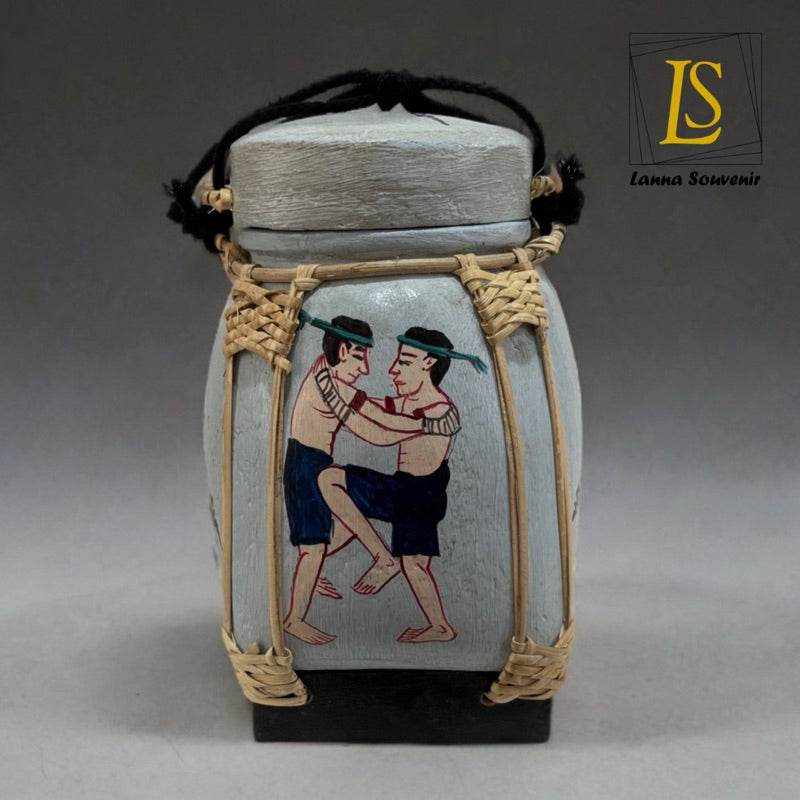 Handmade Thai decorative jar with traditional boxing artwork and woven rattan details from One-Sake.com