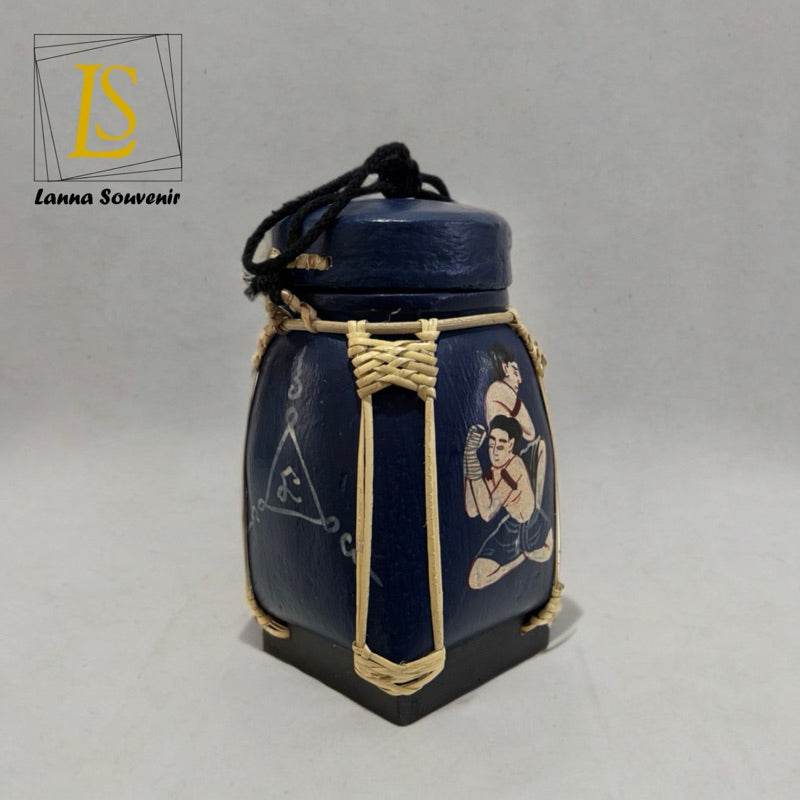 Handmade Thai decorative jar in dark blue with traditional artwork and woven details