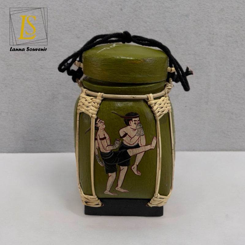Handmade Thai decorative jar with traditional painted design and woven accents from One-Sake.com