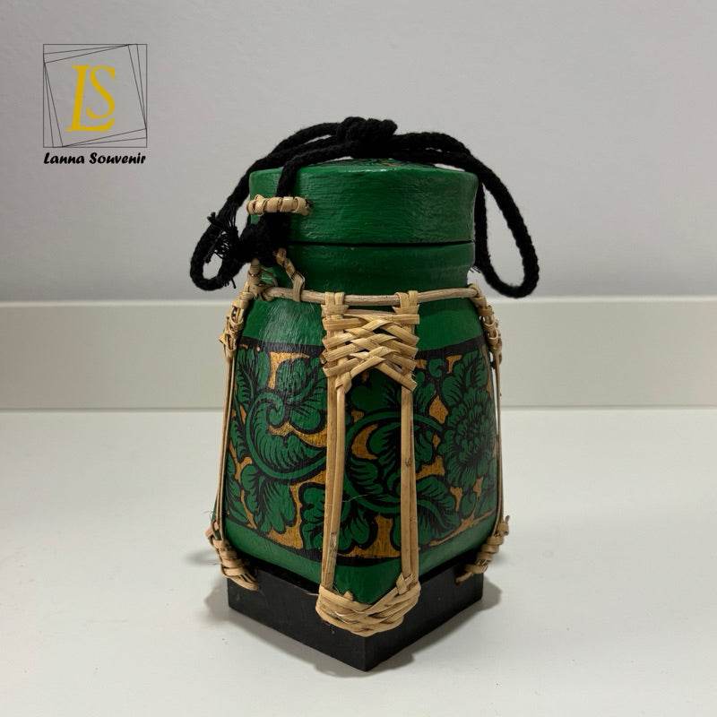 Handmade Thai rice basket with green floral design and woven bamboo details from One-Sake.com