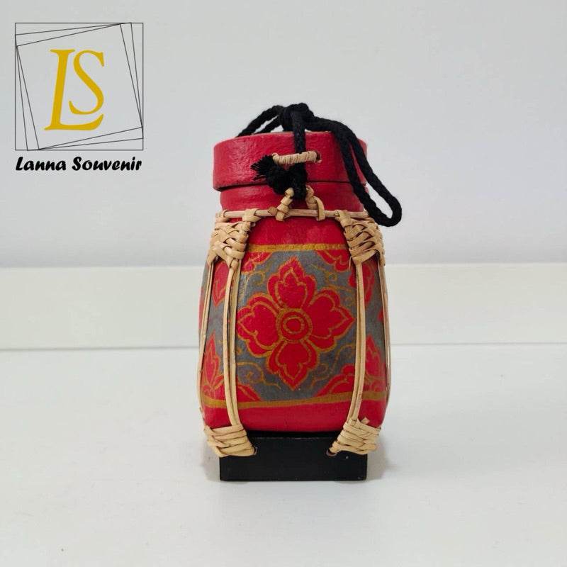 Handmade Thai rice basket with red and gold floral pattern and woven details by One-Sake.com