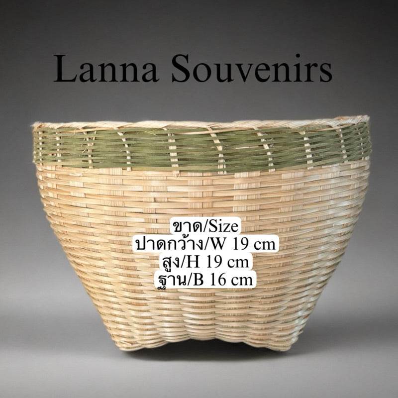 Handmade Thai bamboo basket with natural and green woven design for home storage and organization
