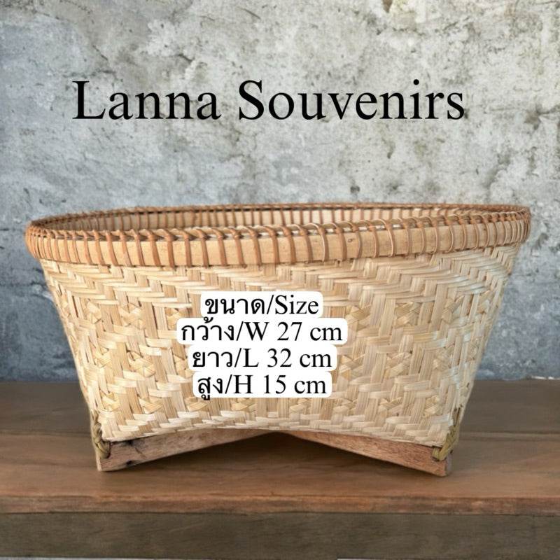 Handmade Thai bamboo basket with woven pattern and wooden base for storage or decor