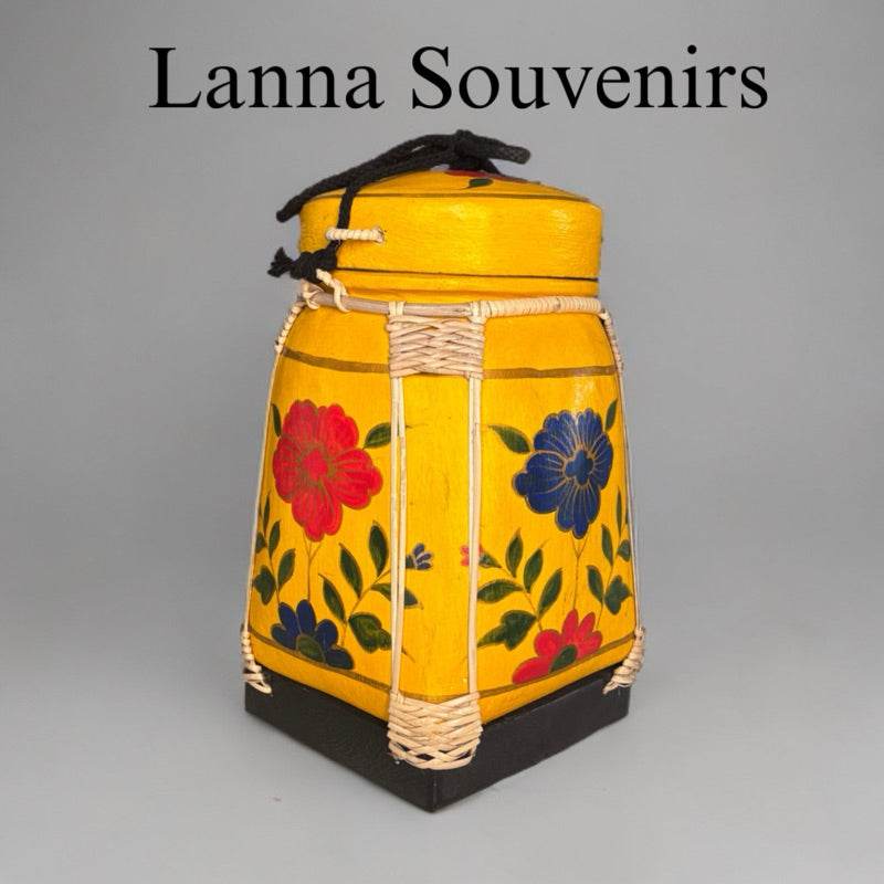 Lanna storage jar with floral pattern in yellow and black for home kitchen use