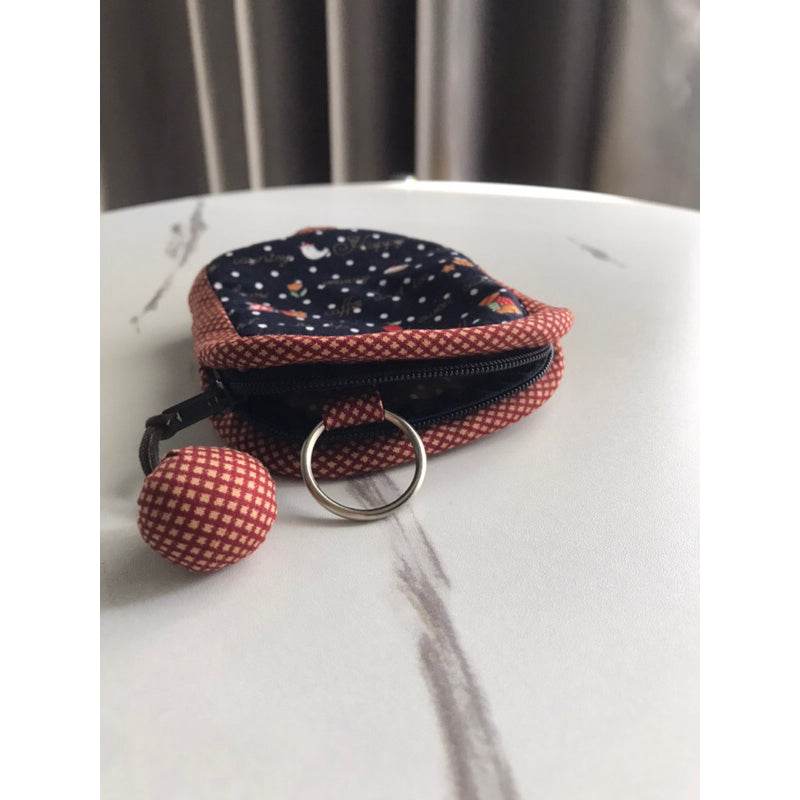 Cotton key pouch for women and men with patterned fabric and zipper closure from One-Sake.com