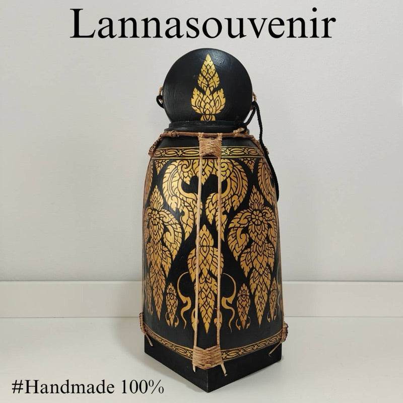 Lanna style bamboo rice box with intricate gold and black traditional patterns handcrafted for home use