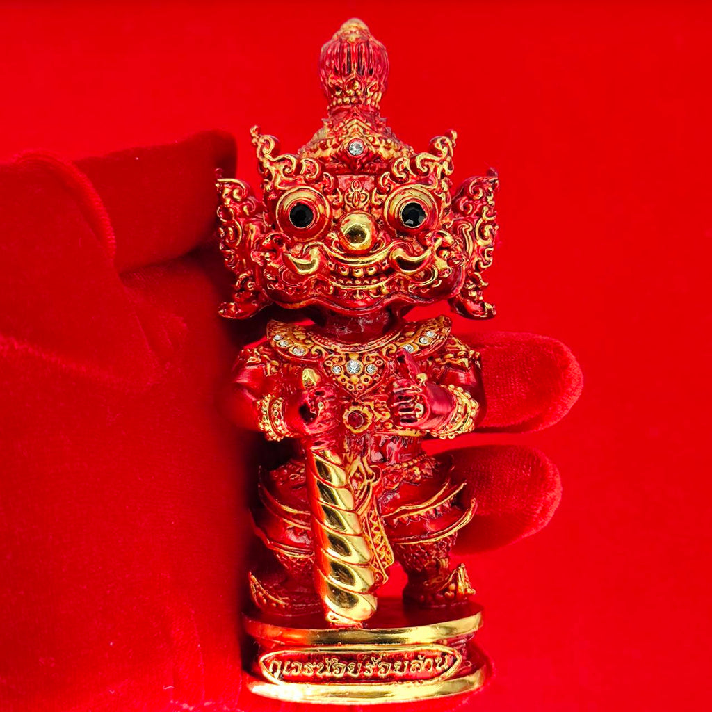 Handcrafted Lord Vesuvanna lucky charm figurine in vibrant red with intricate details