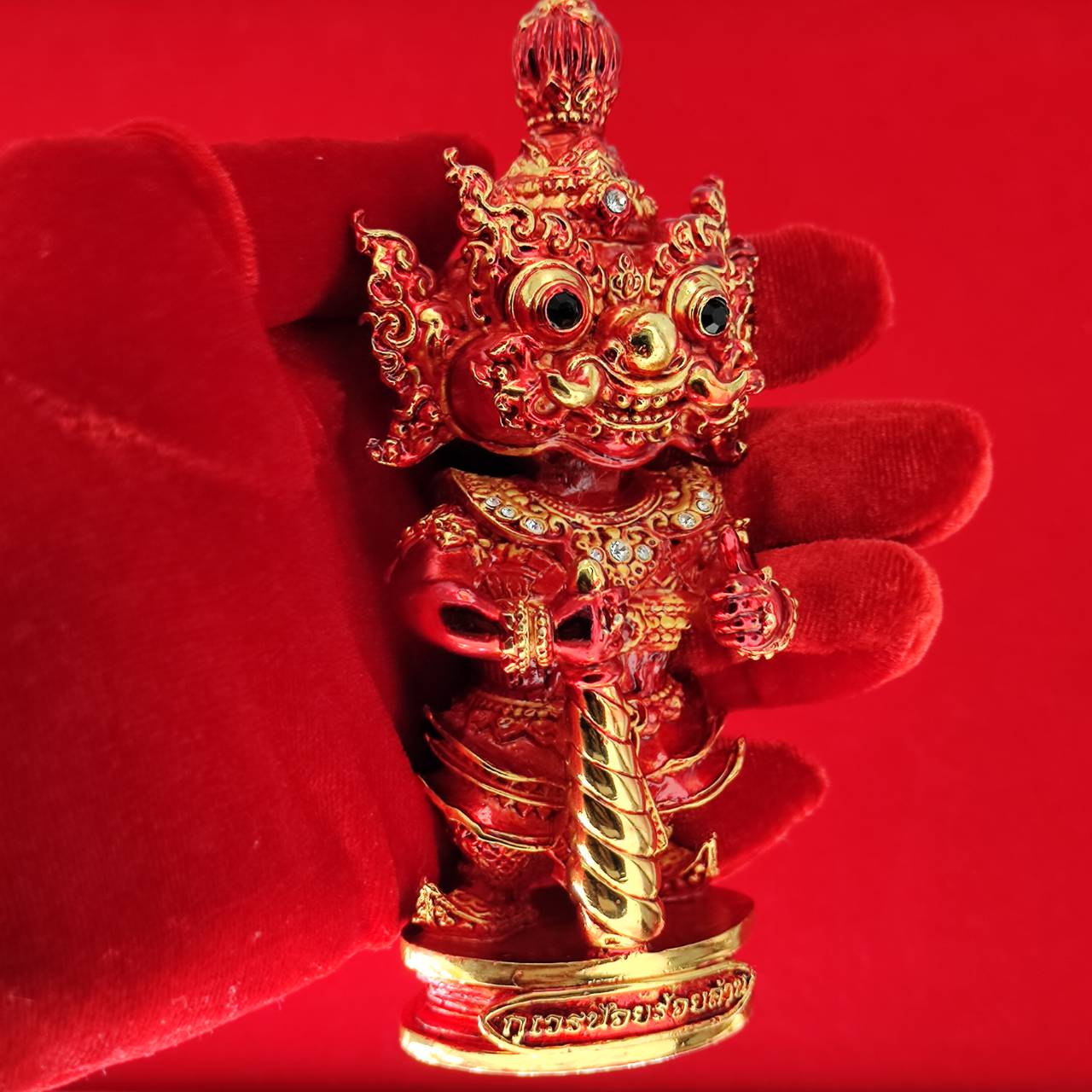 Lord Vesuvanna lucky charm figurine in red with detailed design for home decor and spiritual blessings