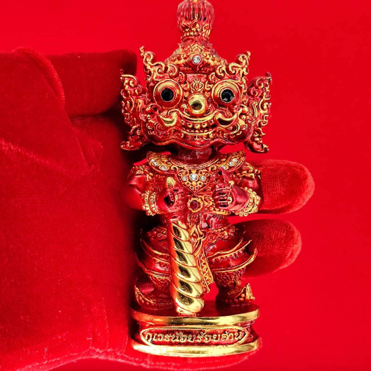 Vibrant Lord Vesuvanna lucky charm figurine with intricate details, perfect for home decor and spiritual beliefs.