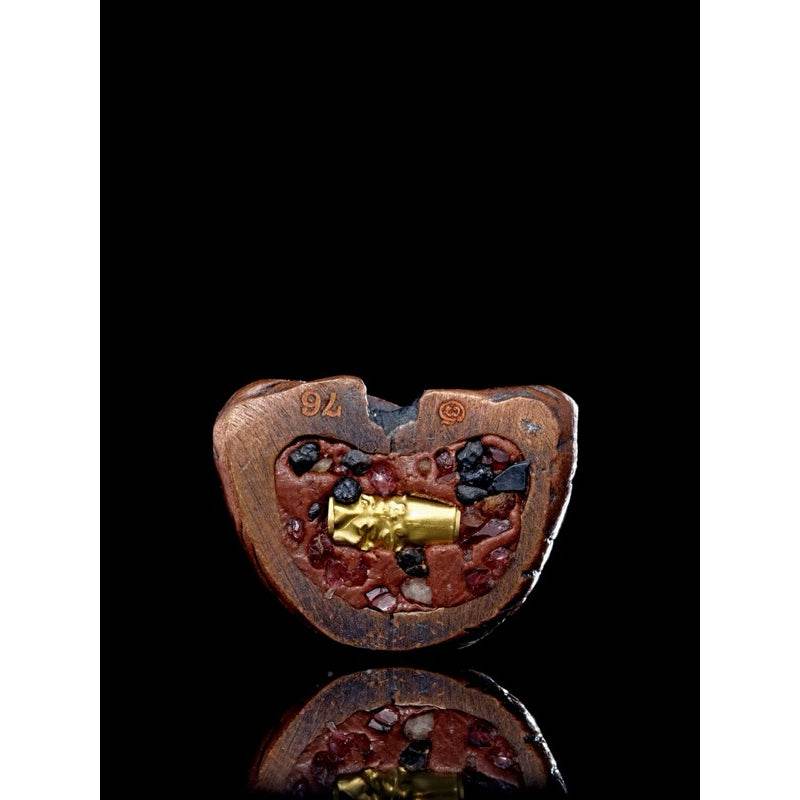 Luang Ta Ruam wat khok samran amulet crafted from wood with embedded gemstones for spiritual protection