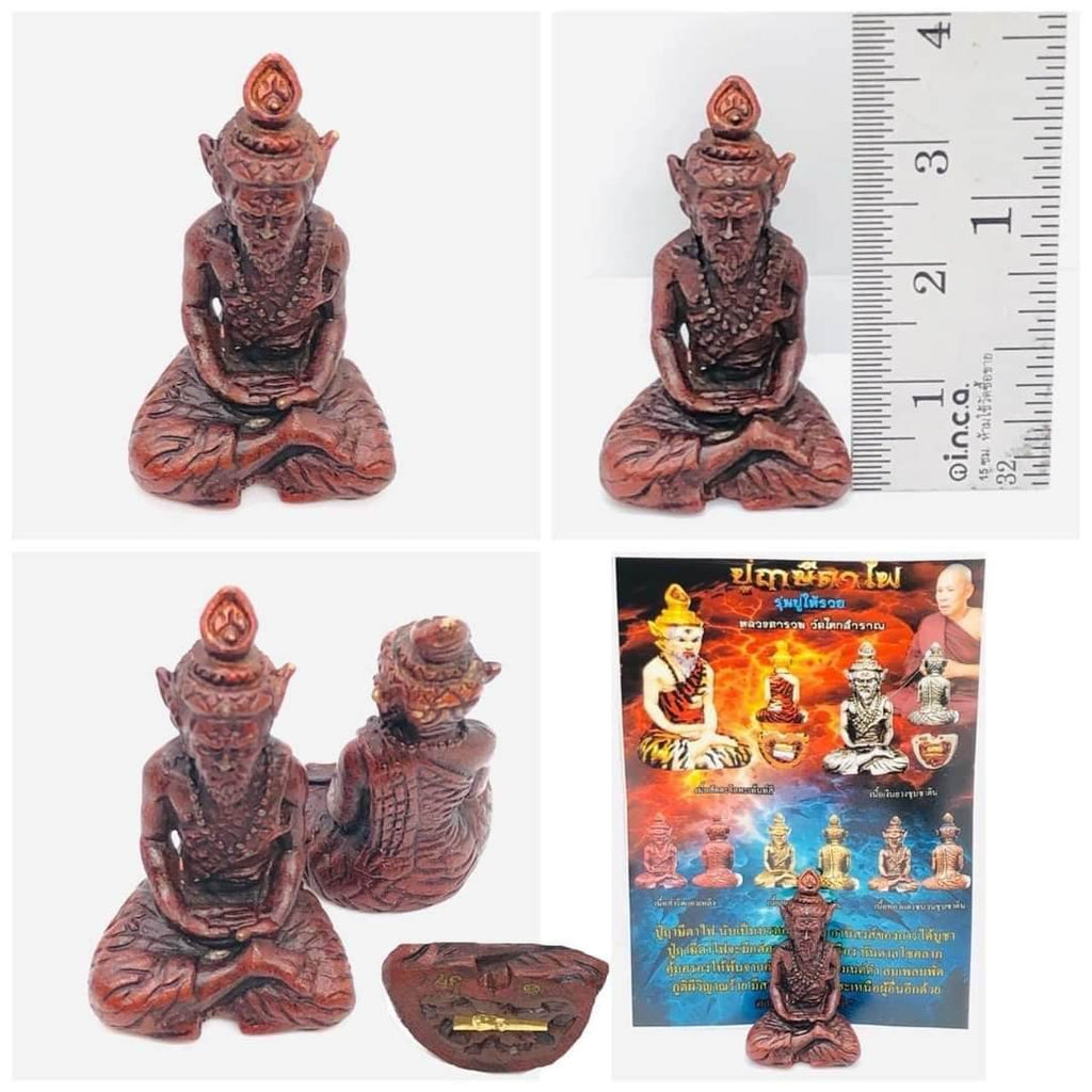 Luang Ta Ruam wat khok samran amulet intricately designed in a seated position with detailed features