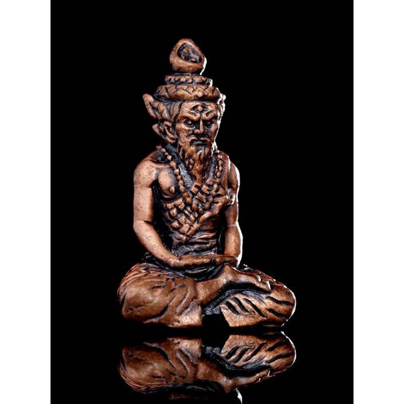 Luang Ta Ruam wat khok samran amulet carved in intricate detail, symbolizing protection and good fortune