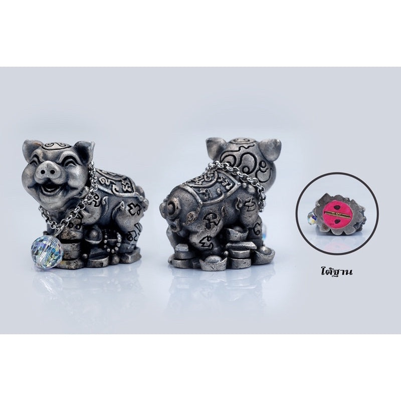Lucky silver pig amulet Thailand with intricate engravings and hanging crystal charm by Thai Blessing Co