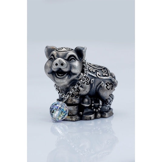 Lucky silver pig amulet Thailand with detailed engravings and decorative crystal pendant