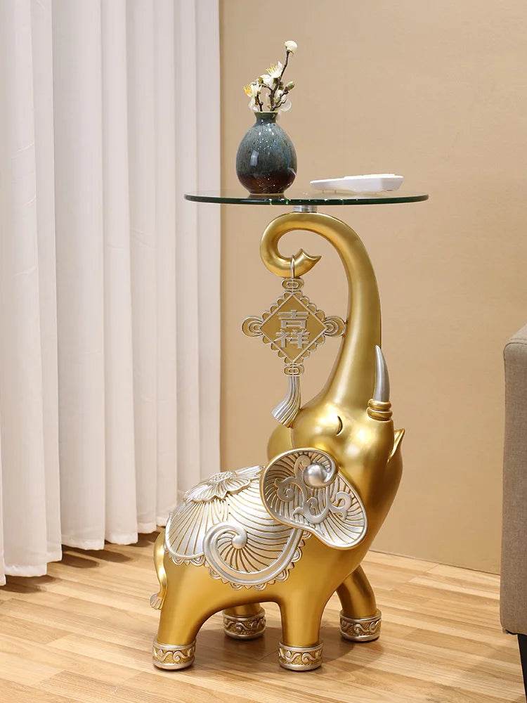 Gold decorative elephant tray for keys and jewelry side table with glass top and ornate tassel