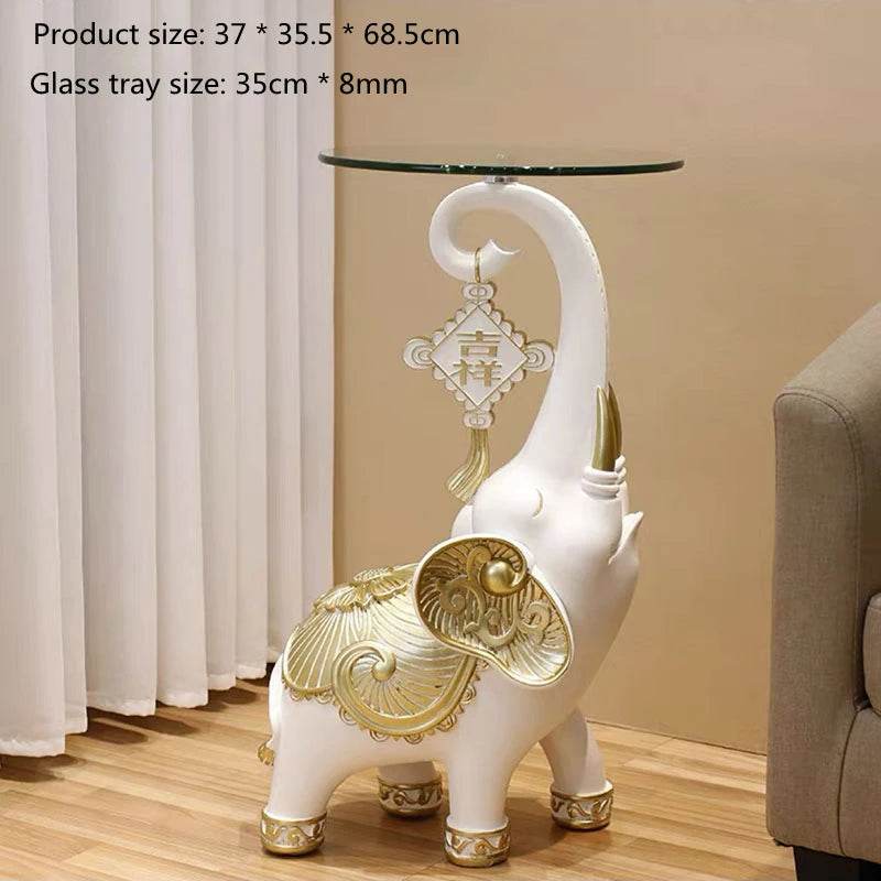 White decorative elephant side table with glass top and gold accents elephant tray for keys and jewelry