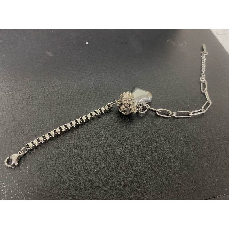 Mae Nang Kwak wealth bracelet featuring silver chain and charm for prosperity and good fortune